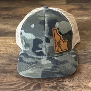Camouflage Trucker Hat with Idaho Sasquatch Patch